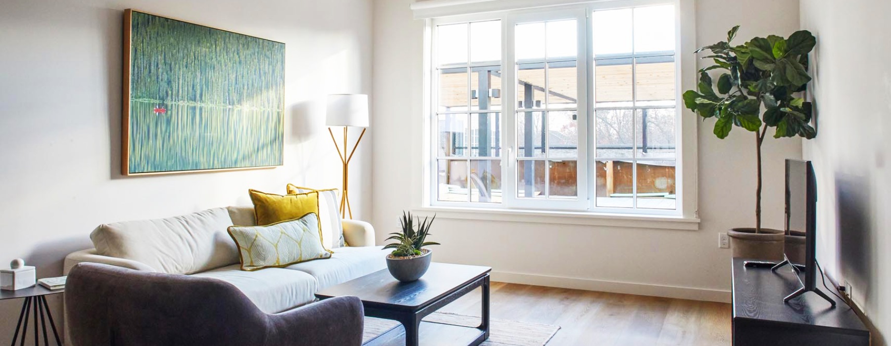 Open space living area with natural lighting