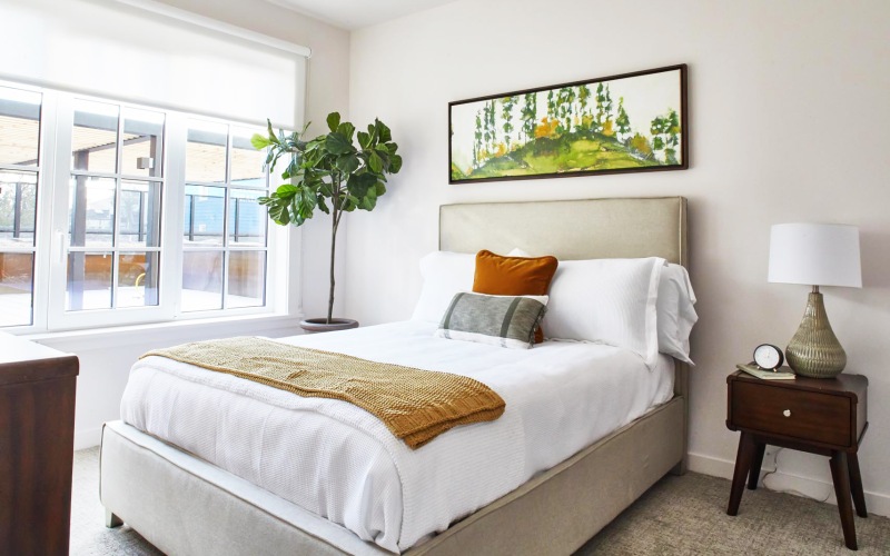 Bedroom with natural lighting and high ceilings